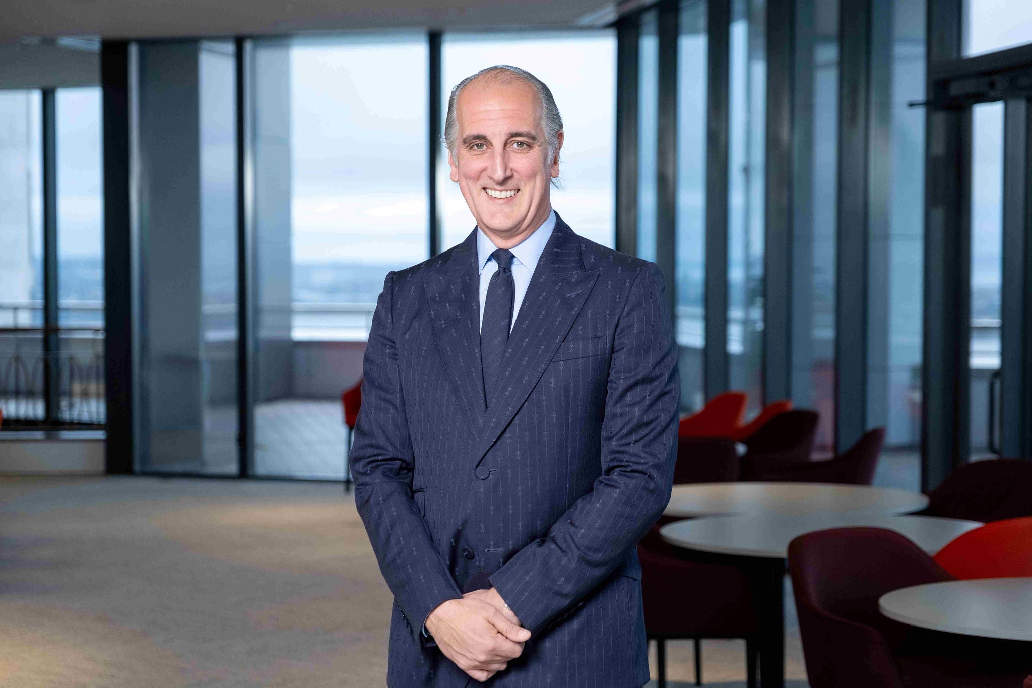 A portrait of Christopher Swasbrook on floor 29 of the Auckland Council building.