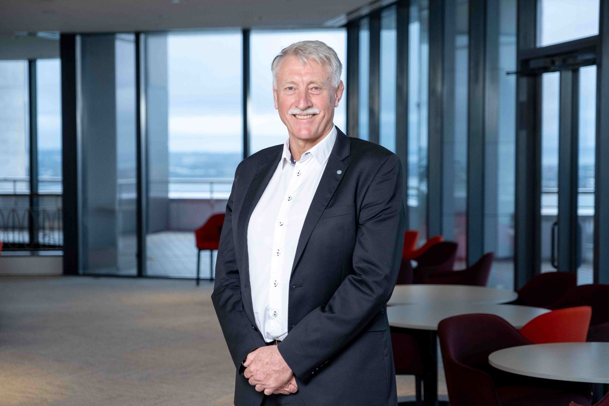 A portrait of Craig Stobo on floor 29 of the Auckland Council building.